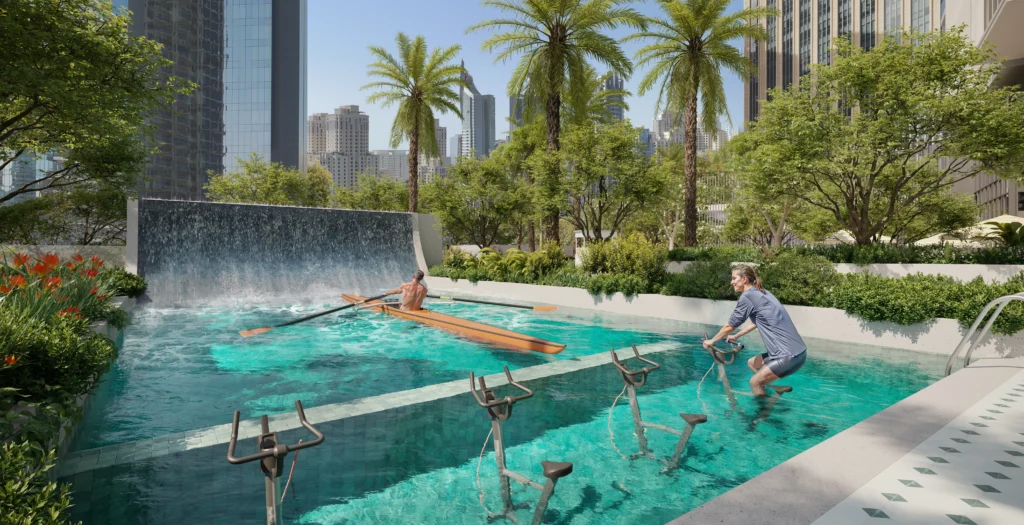 Podium landscape at Rove Home Dubai Marina, showcasing vibrant greenery and modern design elements.